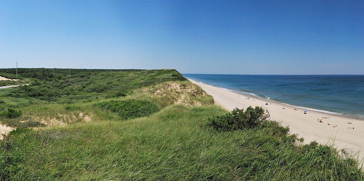 Race Point Light and the surrounding desolate sand dunes of Cape Cod National Seashore in Provincetown Massachusetts